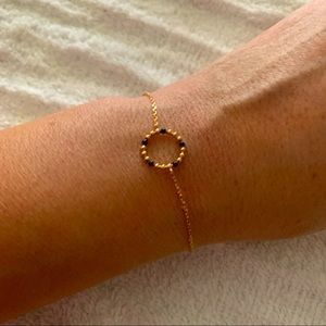 Gold tone with black enamel bracelet from Paris